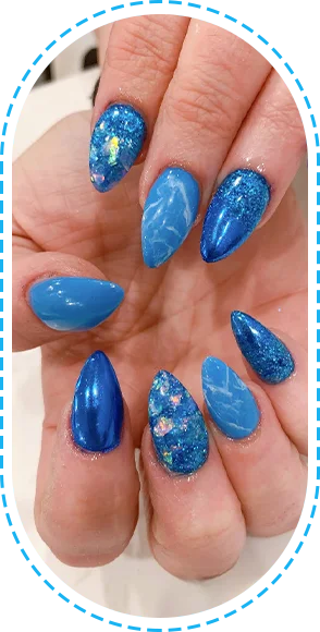 Oceanic Nails Spa, Close-up of blue almond-shaped manicured nails.
