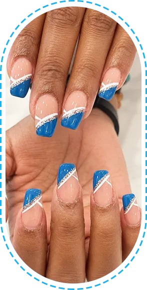 Oceanic Nails Spa, Close-up of blue and white French-style manicured nails.