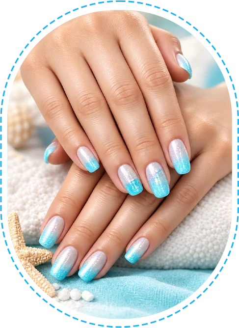 Oceanic Nails Spa, Close-up of pastel blue manicured nails with glitter accents.